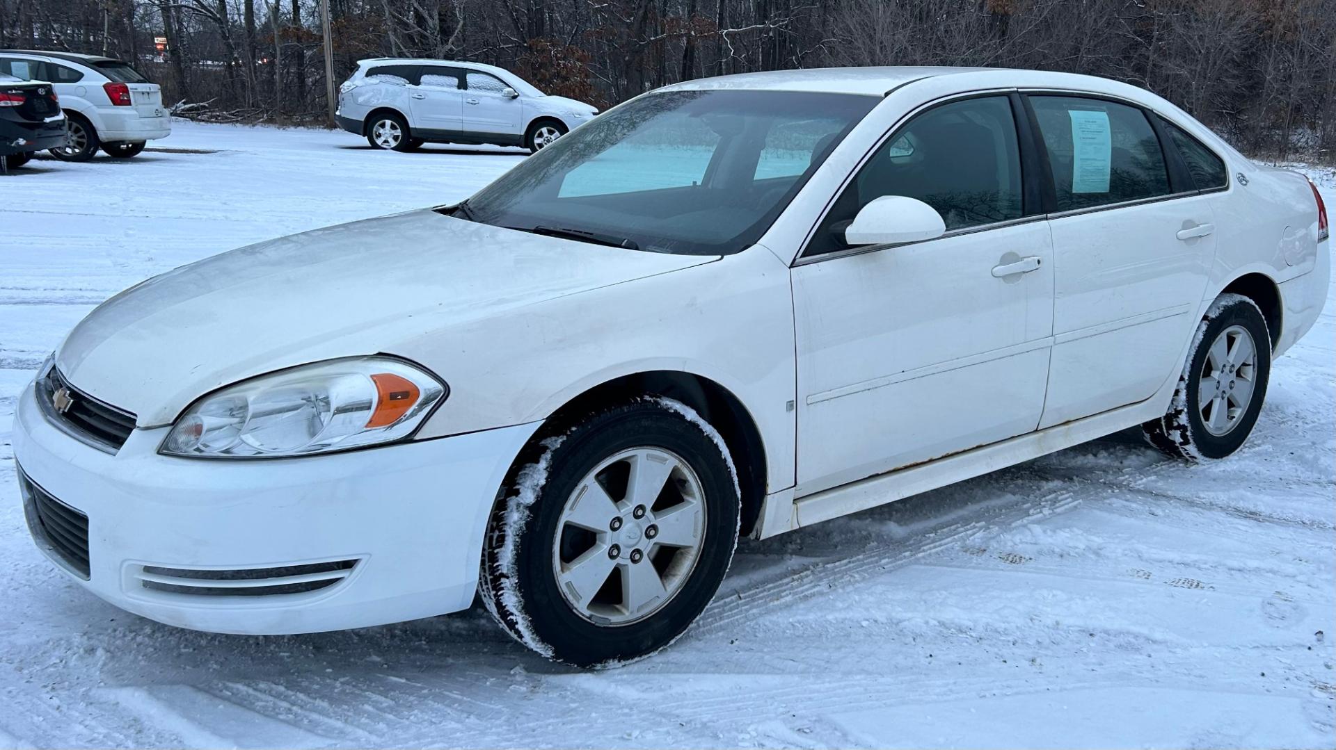 2009 White Chevrolet Impala LT (2G1WT57K791) with an 3.5L V6 OHV 12V FFV engine, 4-Speed Automatic Overdrive transmission, located at 17255 hwy 65 NE, Ham Lake, MN, 55304, 0.000000, 0.000000 - Photo#0